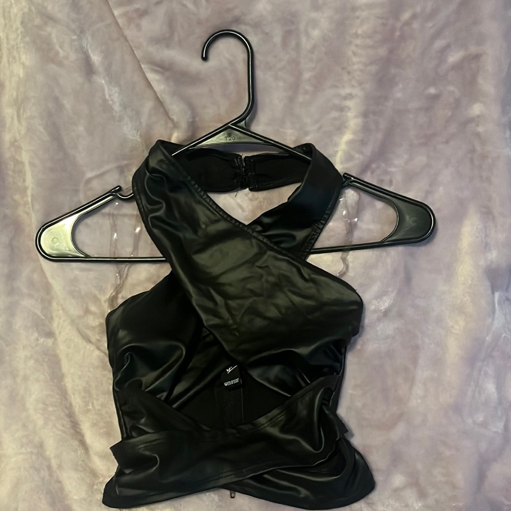 Windsor pleather top. Super cute on and super flattering. Very stretchy.